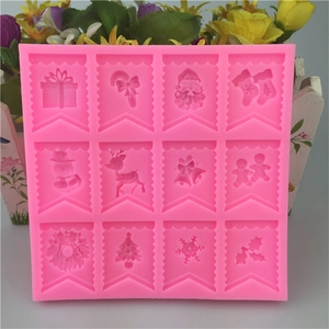 Pink silicone Christmas flag mold with embossed Santa, reindeer, and snowflake designs