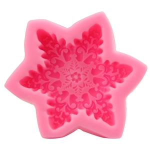 Pink snowflake silicone mold for DIY soap making and Christmas baking decoration