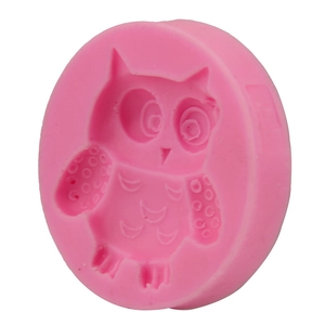 Pink round silicone mold featuring a detailed cartoon owl pattern for cake decorating