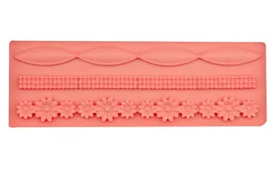 Pink silicone wave lace mold with daisy and bead patterns for fondant cake decoration