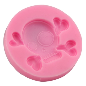Pink silicone skull and crossbones heart mold for Halloween chocolate fondant baking
