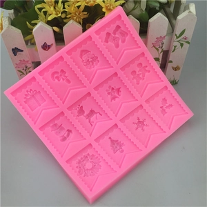 Pink silicone Christmas flag mold with 12 slots for fondant cake decorating and baking