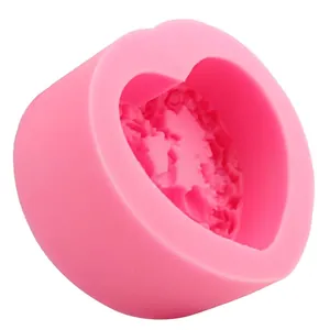 Pink heart-shaped silicone mold with floral relief for DIY handmade soap and fondant cake
