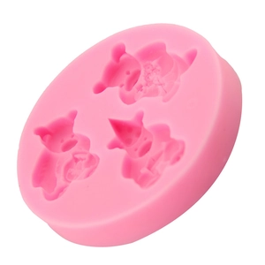 Pink silicone mold featuring three cartoon bears for chocolate and fondant DIY baking