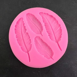 Pink round silicone feather mold for fondant cake decorating and DIY soap making crafts