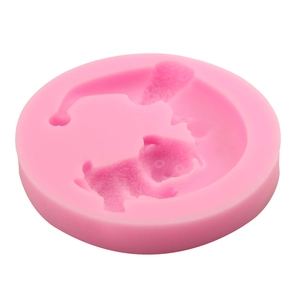 Pink silicone mold featuring a 3D cat wearing a Christmas hat for DIY cake fondant and soap