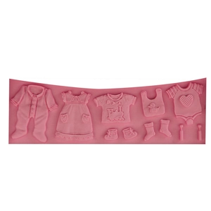 Pink silicone fondant mold featuring baby clothes designs for chocolate and cake decor