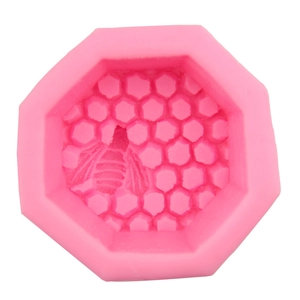 Pink honeycomb silicone mold with 3D bee relief for fondant cake decoration and baking tools