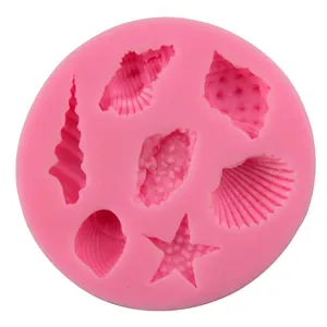 Pink silicone mold featuring starfish and seashell shapes for fondant and DIY baking