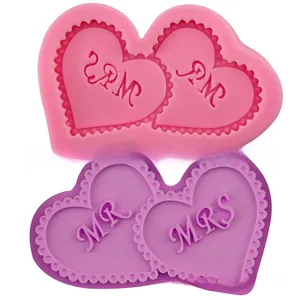 Detailed macro of pink and purple Mr & Mrs double heart silicone fondant cake molds