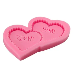 Pink heart-shaped silicone mold with MR MRS lettering for cake decorating and DIY crafts