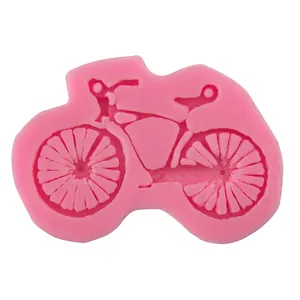 Pink motorcycle-shaped silicone fondant mold for cake decorating and DIY baking crafts