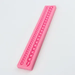 Pink silicone chain mold for fondant cakes with two rope patterns on white background