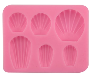 Pink silicone mold with six unique seashell cavities for DIY chocolate and waffle making