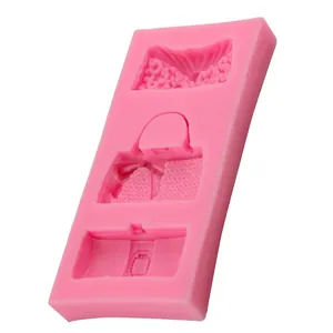 Pink silicone mold featuring bow handbag and textured wave patterns for cake fondant
