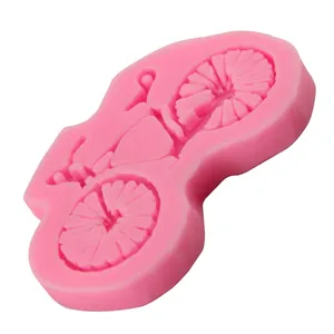 Pink silicone bicycle shaped fondant cake mold for creative DIY baking decorations