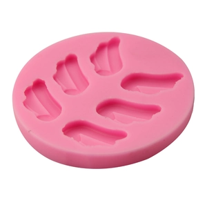Pink silicone mold featuring six different angel wing shapes for fondant and chocolate DIY
