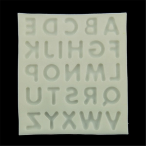 White silicone alphabet mold for fondant or chocolate with 26 uppercase letter shapes