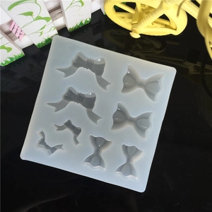 Translucent silicone mold with 8 bow-knot patterns for DIY resin and plaster crafts