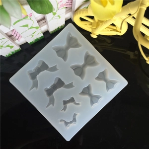 Translucent silicone mold with 8 diverse bow shapes for resin casting and DIY crafts