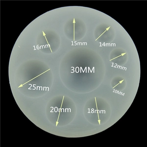 Detailed view of silicone mold with 9 semi-sphere slots ranging from 10mm to 30mm