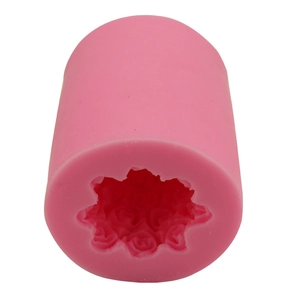Pink silicone cake mold featuring detailed rose flower cylinder patterns for DIY baking
