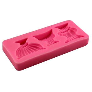 Pink silicone mold with three elegant dress shapes for fondant and cake decorating