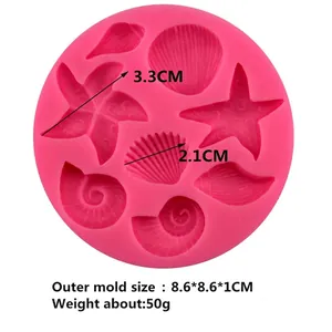 Pink silicone mold featuring starfish and seashell designs for DIY chocolate cake decorating