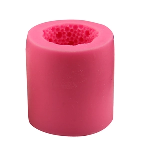 Pink cylindrical silicone mold with honeycomb texture for soap and candle making