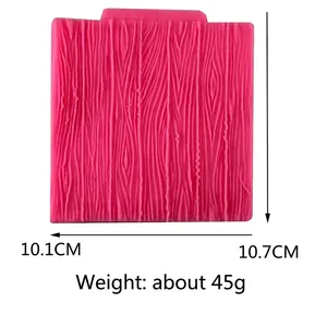 Pink silicone cake mold with wood bark texture for DIY baking and chocolate crafts