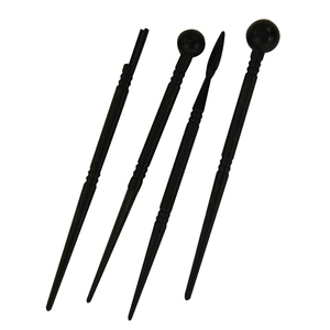 Set of four black fondant modeling tools with different shaping tips for clay sculpture