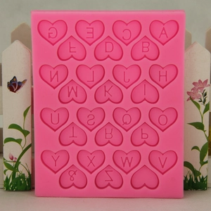 Pink heart-shaped silicone mold with A-Z alphabet letters for fondant and DIY crafts