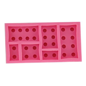 Pink silicone mold for building block shapes including 2x4 and 2x2 bricks for DIY baking