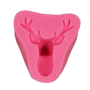 Pink silicone mold featuring a detailed reindeer head design for DIY cake decorating