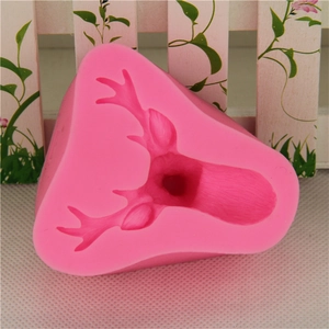 Detailed pink silicone mold in reindeer head shape for DIY fondant and chocolate baking
