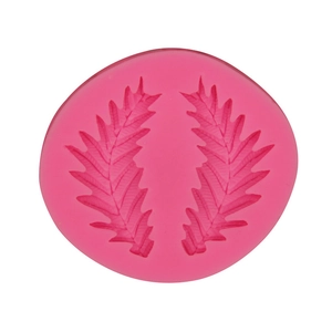 Pink silicone mold for fondant featuring symmetrical olive leaf and wheat patterns