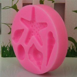 Pink silicone mold with seashell and starfish shapes for fondant and handmade soap