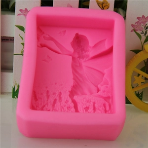 Pink silicone mold featuring an angel lady with butterflies for soap and candle making