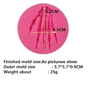 Pink silicone mold for Halloween skull hand fondant and chocolate cake decorations