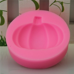 Pink pumpkin shaped silicone mold for DIY Halloween baking, fondant, and chocolate making