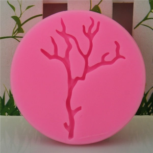 Pink silicone mold featuring coral branch shapes for DIY fondant cake decorating