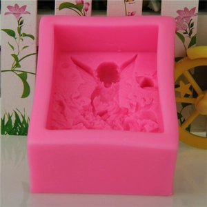 Bright pink silicone mold with detailed 3D angel girl on a flower for cake and soap