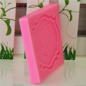 Pink silicone fondant mold featuring Happy Birthday inscription for cake decoration