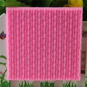 Pink square silicone mold with knitted sweater texture for cupcake cookies and fondant