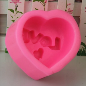 Pink heart-shaped silicone mold with LOVE embossing for DIY baking and handmade soaps