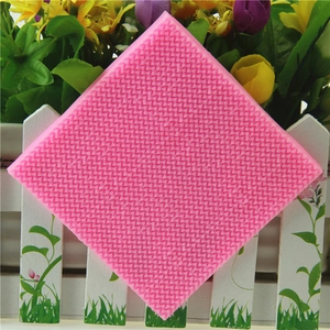 Pink silicone fondant mold with detailed knitted sweater texture for cake decorating