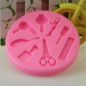 Pink silicone hair tool fondant mold with dryer, scissors and comb shapes for cake decor