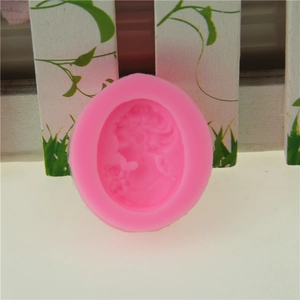 Detailed pink silicone mold featuring a refined female relief portrait for cake decorating