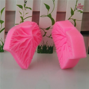 Pink leaf-shaped silicone fondant mold set with deep vein textures for DIY cake decoration
