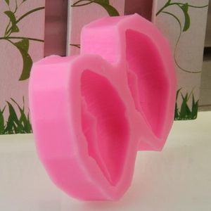 Pink heart-shaped silicone mold for DIY cake baking and handcrafted candle making